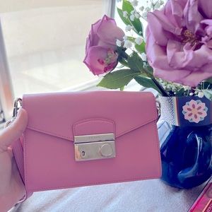 Authentic prada hand bag in the colour petalo/pink